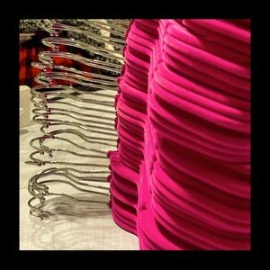 Bright hot pink velvet hangers with silver hooks
